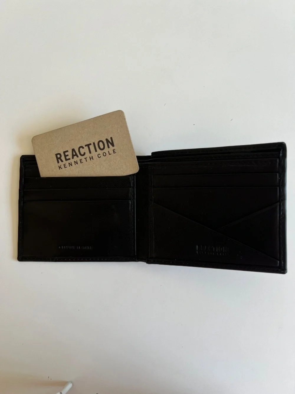 Reaction Kenneth Cole new card